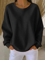 Sweater til damer med rund hals, lange ærmer og struktur