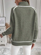 Grøn rullekravesweater til damer med kontrastfarvet kant
