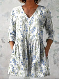 Tunica donna a fiori, scollo a V, manica 3/4