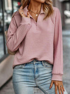 Jersey de mujer de cuello medio con cremallera 1/4 y textura de canalé