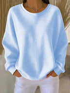 Camisola de mulher com textura em favo, decote redondo e corte folgado