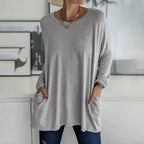Damski sweter oversize z okrągłym dekoltem, rękawami trzy czwarte i kieszeniami