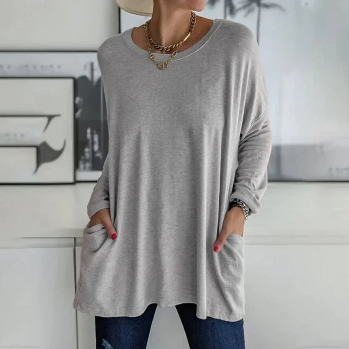 Damski sweter oversize z okrągłym dekoltem, rękawami trzy czwarte i kieszeniami