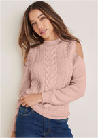 Pull à torsades femme épaules dénudées