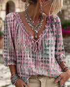 Blusa de mujer de lunares con escote en V y cordones