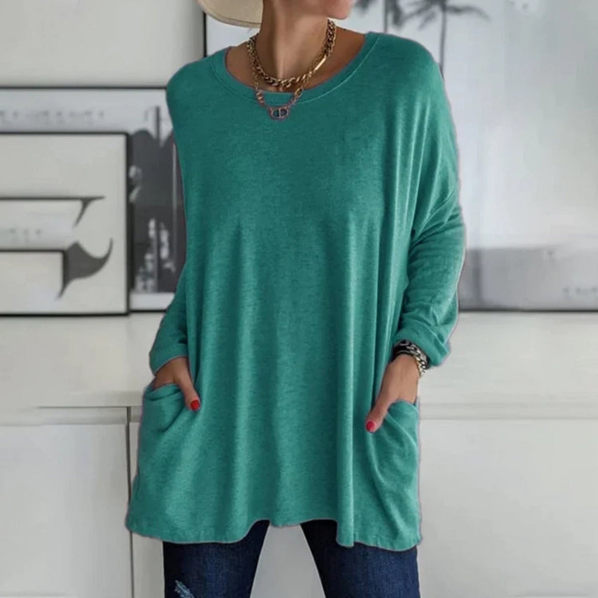 Damski sweter oversize z okrągłym dekoltem, rękawami trzy czwarte i kieszeniami
