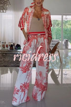 Completo donna a motivo vegetale rosso, camicia e pantaloni