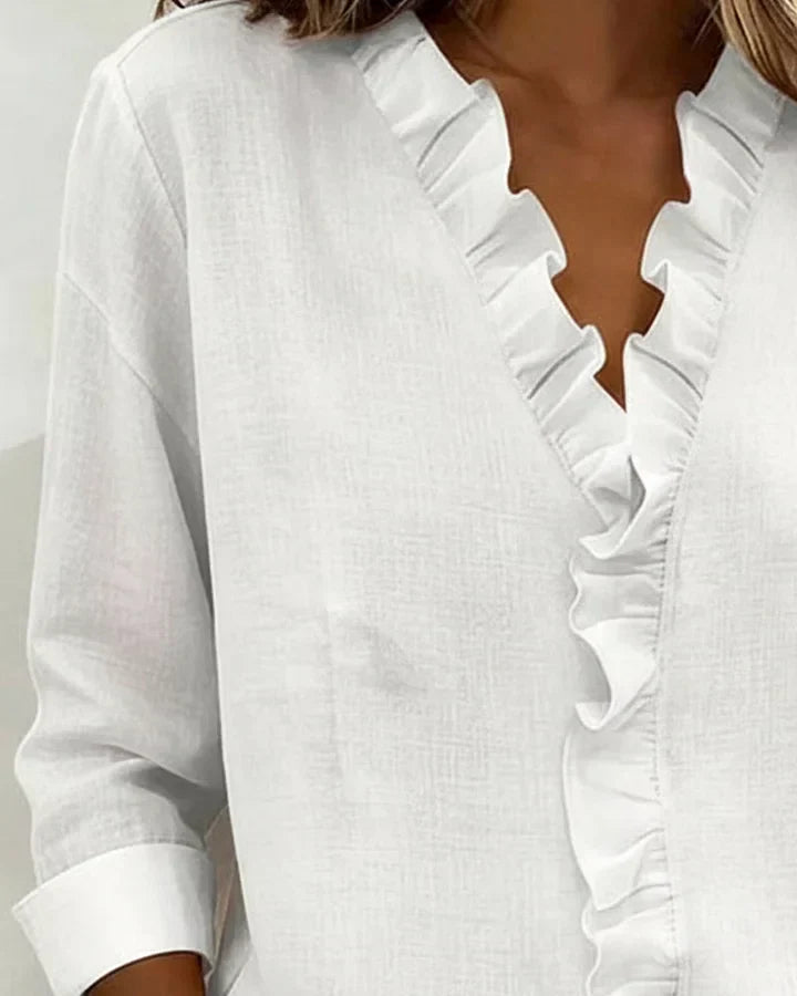 Blusa de mujer con volante en el escote en V y corte holgado