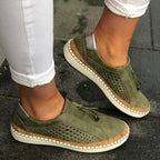 Damskie sneakersy wsuwane z perforowanymi bokami i ozdobnym frędzlem