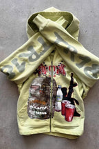 Sweat à capuche zippé graffiti jaune