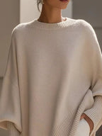 Jersey oversize de mujer con puños acanalados y bajo asimétrico