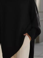 Jersey oversize de mujer con puños acanalados y bajo asimétrico