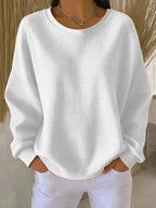 Sweater til damer med rund hals, lange ærmer og struktur