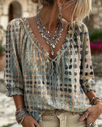 Blusa de mujer de lunares con escote en V y cordones