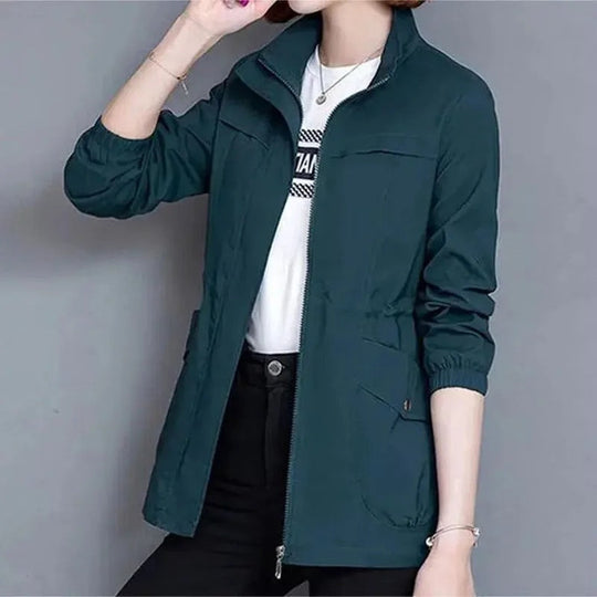 Veste femme de type trench à col montant et poches