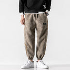 Pantalones de chándal de hombre con bandas laterales y perneras ajustadas