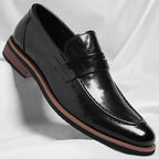 Mocassins penny de homem com costuras e salto baixo