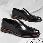 Mocassins penny de homem com costuras e salto baixo