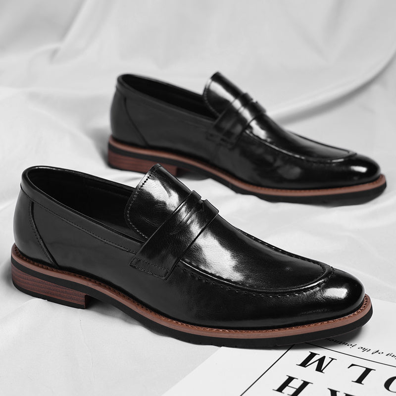 Mocassins penny de homem com costuras e salto baixo