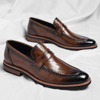 Mocassins penny de homem com costuras e salto baixo