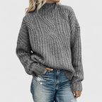 Jersey de mujer de cuello alto de punto trenzado