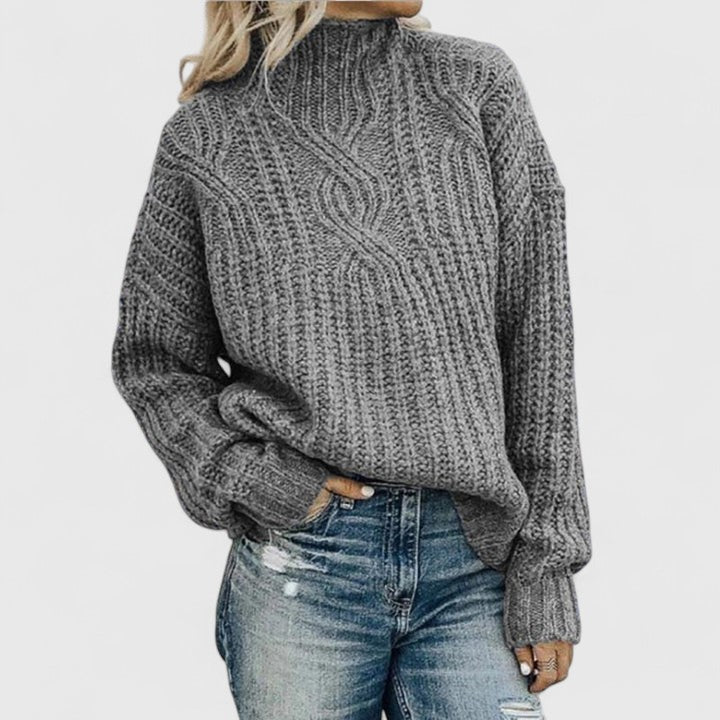 Jersey de mujer de cuello alto de punto trenzado