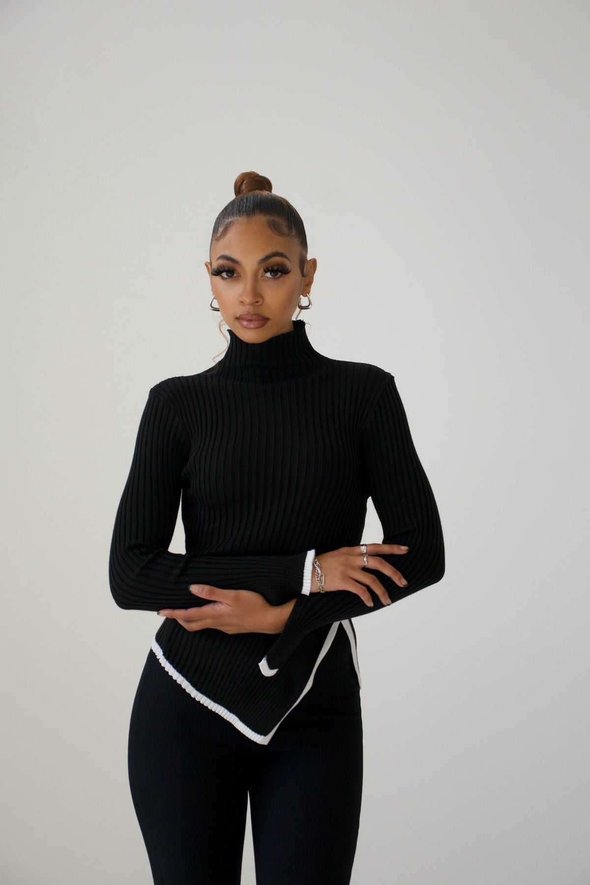 Pull col roulé côtelé femme à bas asymétrique