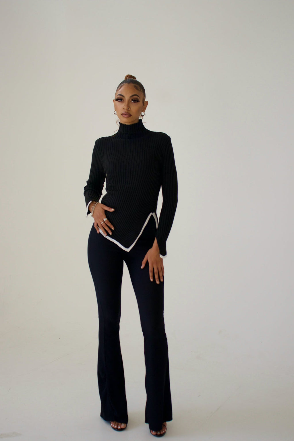 Pull col roulé côtelé femme à bas asymétrique