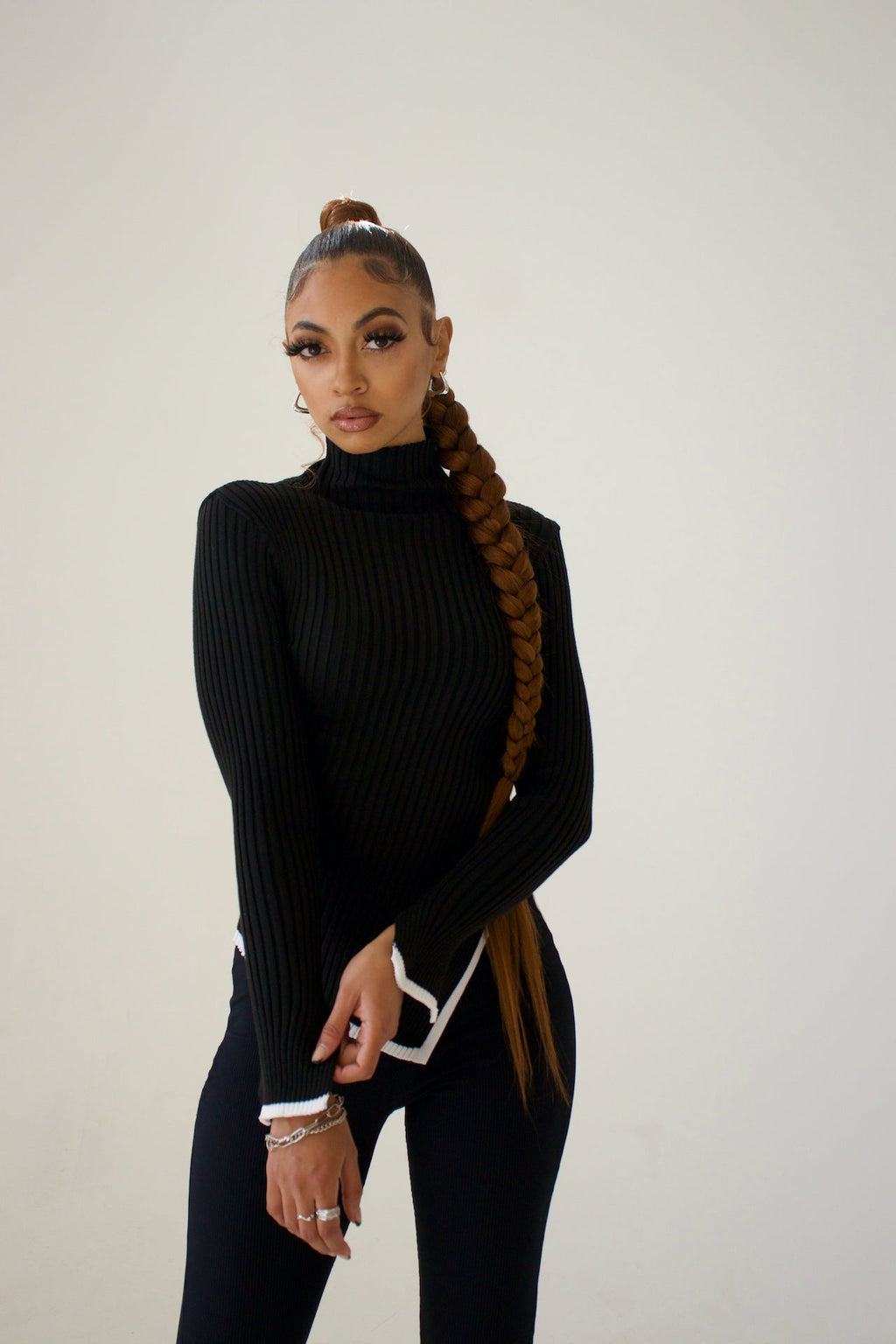 Pull col roulé côtelé femme à bas asymétrique