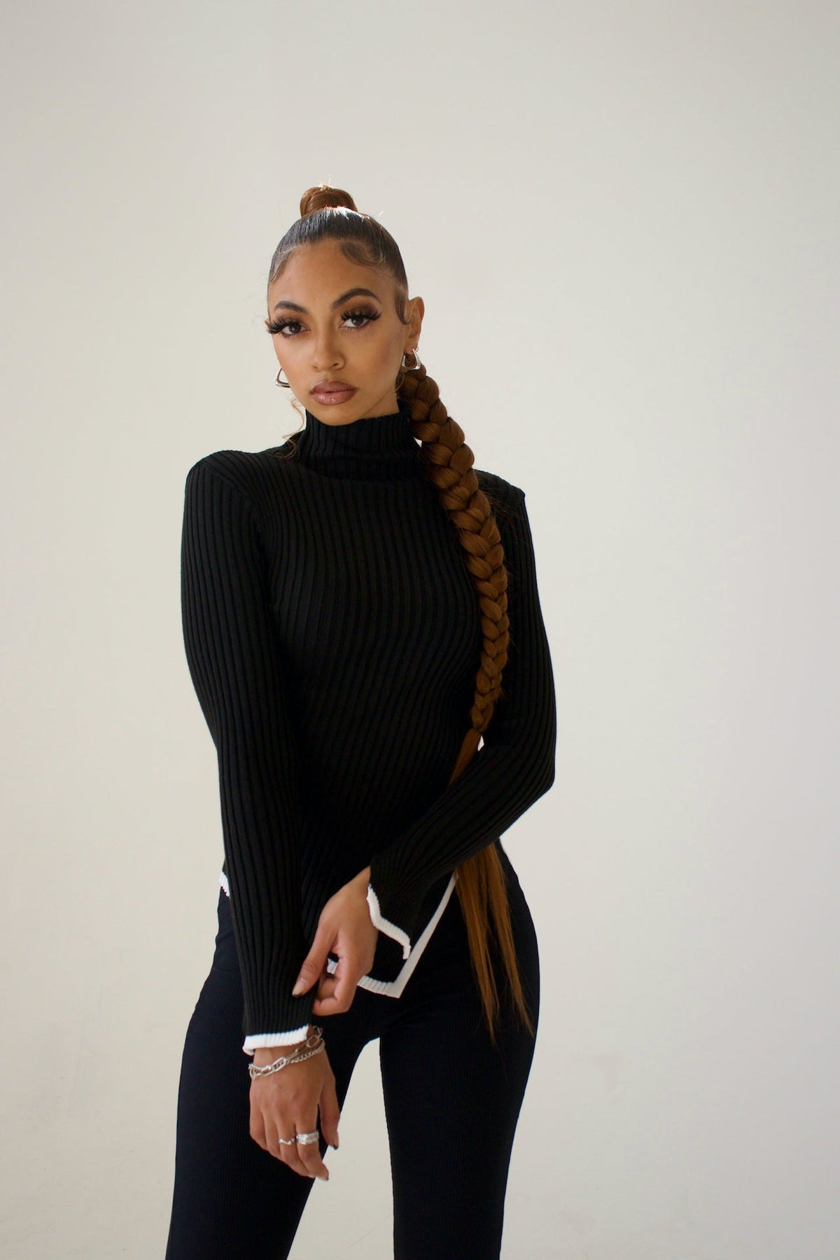 Pull col roulé côtelé femme à bas asymétrique