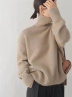 Jersey de mujer de cuello alto con manga larga y puños de canalé