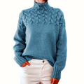 Pull femme à col roulé, torsades et manches longues