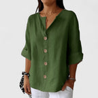 Blusa de mulher com botões, decote em V e manga 3/4