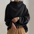 Pull oversize femme noir à large col