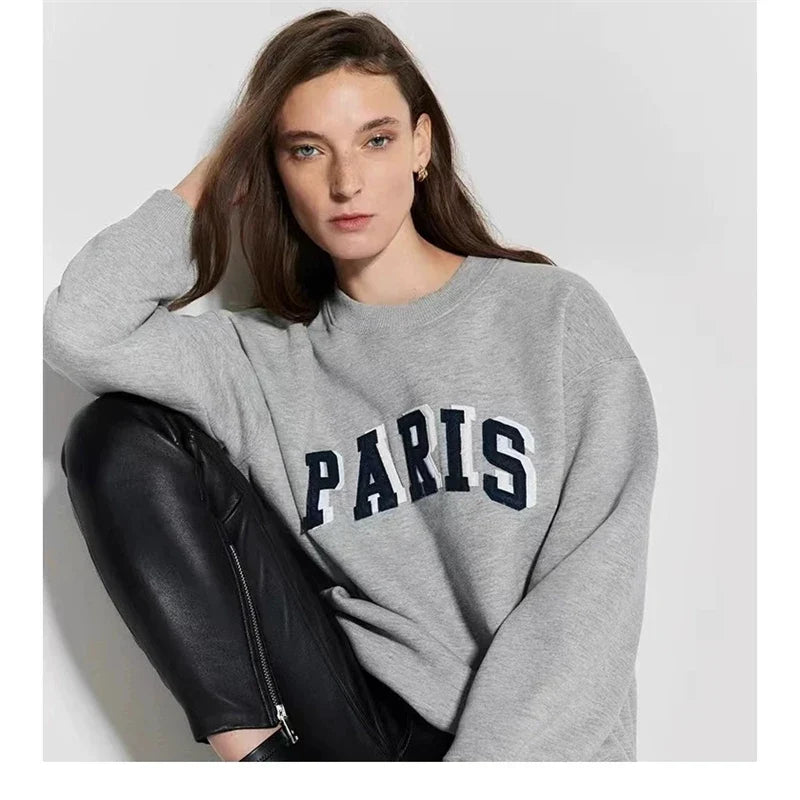 Sweatshirt til damer med grafisk tryk og rund hals