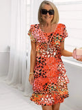 Vestido midi de mulher de flores com folhos em camadas
