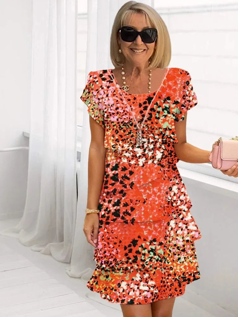 Vestido midi de mulher de flores com folhos em camadas