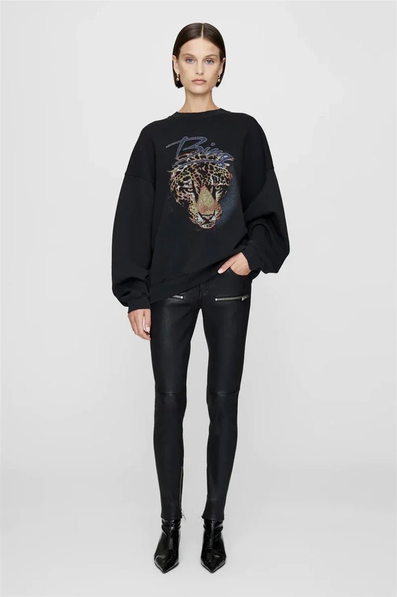 Sweatshirt til damer med grafisk tryk og rund hals