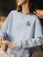 Felpa donna con ricamo zebra, girocollo, bottoni laterali