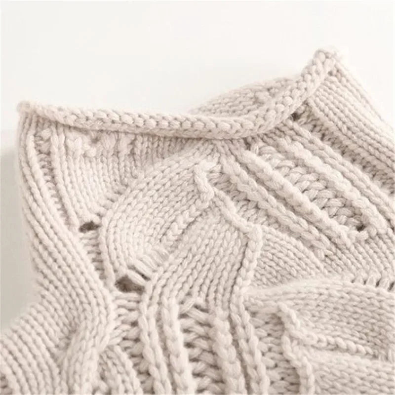 Maglione donna a collo alto con motivo a trecce