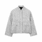 Chaqueta corta texturizada de mujer con cuello mao y bolsillos