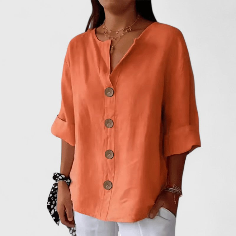 Blusa de mulher com botões, decote em V e manga 3/4
