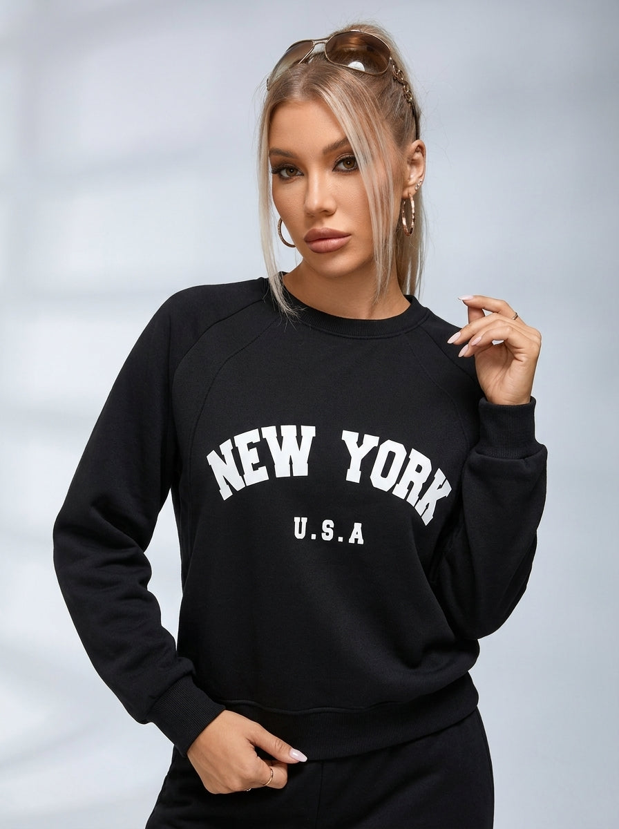 Sweatshirt til damer i sort med New York-tryk og rund hals