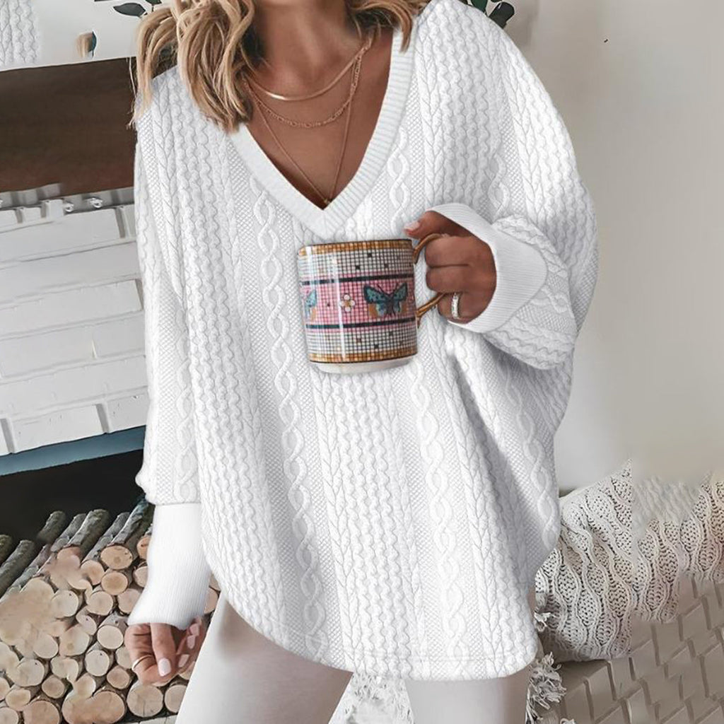 Pull femme blanc à col V et maille torsadée