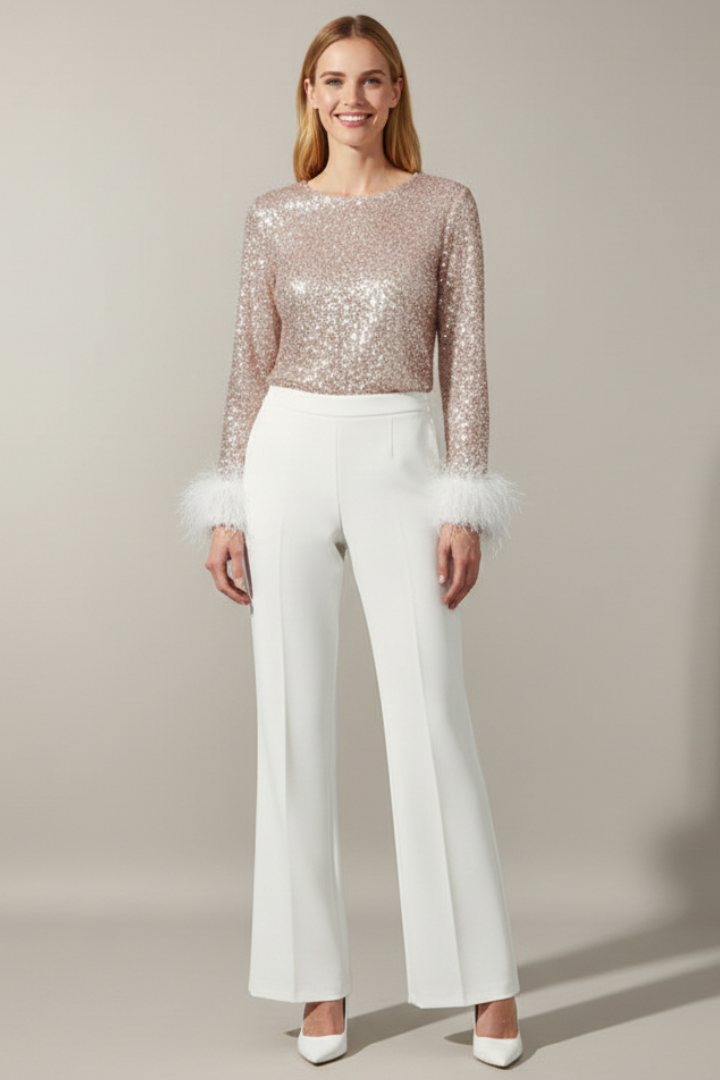 Tuta donna con top di paillettes e polsini con piume