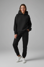 Completo due pezzi donna con felpa con cappuccio e pantaloni con vita elastica