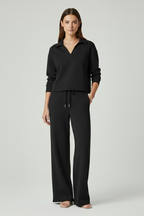 Completo donna con top scollo a V e pantaloni a gamba ampia