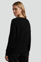 Camisola de mulher com decote em V e mangas compridas
