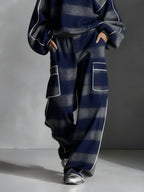 Conjunto de mujer de sudadera y pantalones a rayas en azul marino y gris