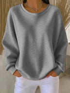 Sweater til damer med rund hals, lange ærmer og struktur
